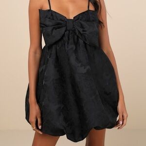 Coquettish Charm Black Bubble-Hem Bow Mini Dress With Pockets